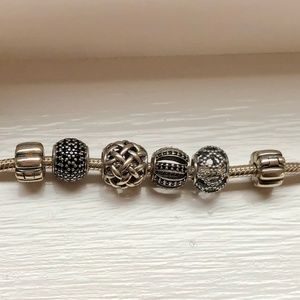 Pandora bracelet with black and silver charms